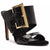 A black high-heeled sandal with a wide wraparound strap featuring an embossed crocodile pattern and a large gold-tone rectangular buckle, shown on a white background.