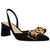 Black sandal with a leopard print bow on a white background