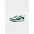 A pair of low-top sneakers in dark green and white, featuring a thick white midsole and a side logo, displayed against a clean white background.