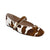 A single women's flat shoe with a brown and white cow print pattern, featuring a Mary Jane strap with a gold-tone buckle, shown on a plain white background.