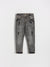 Gray distressed jeans on a white background