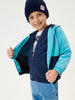 Child wearing a blue and navy jacket with a white background
