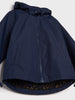 Navy blue raincoat with a patterned lining on a white background