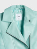 Light blue jacket with a brand label on a white background