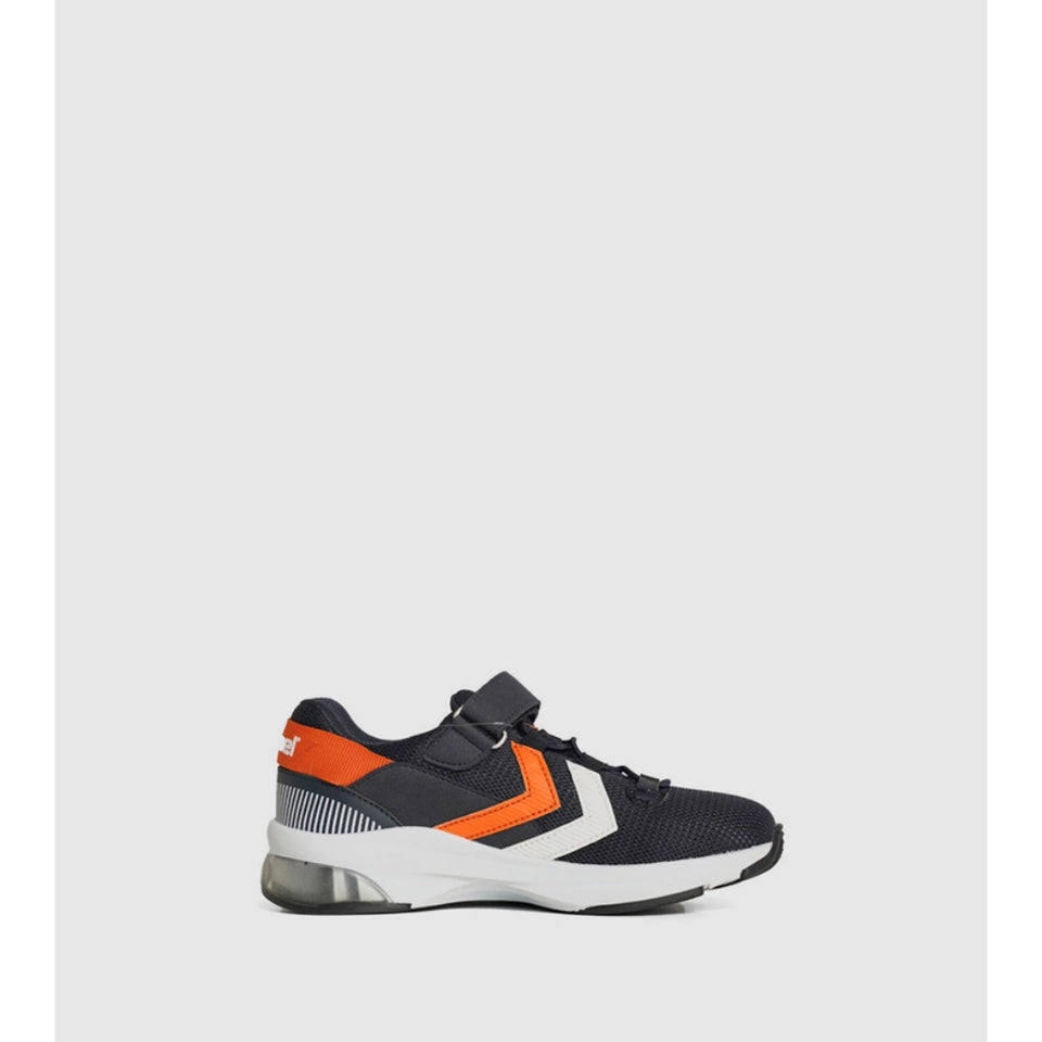 A single athletic sneaker shown in profile against a light gray background. The shoe features a dark navy blue mesh upper, a bright orange chevron accent on the side, a white midsole, and a hook-and-loop strap closure.