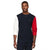 A man wearing a Tommy Hilfiger colorblock crewneck sweatshirt with navy blue, white, and red color blocking, photographed against a solid white background.