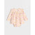 A long-sleeve baby bodysuit in a light cream color with a small all-over floral print in pink, purple, and orange, displayed flat against a light gray background.