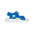 A blue children's sandal with neon green accents and a white sole, shown in profile against a plain white background.
