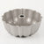 A silver aluminum fluted bundt cake pan with a central tube, photographed on a clean white background.