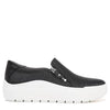 A black slip-on platform sneaker with a textured upper, a silver-tone zipper detail, and a thick white sole, shown from a side profile on a white background.