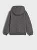 Quilted jacket with a hood on a light gray background
