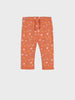 Floral-patterned pants on a white background