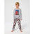 A young boy modeling a two-piece gray pajama set featuring a graphic print of a red race car on the chest and an allover red race car pattern on the pants, set against a plain light gray background.