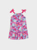 Colorful floral dress with pink straps on a white background