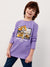 Child wearing a purple long-sleeve shirt with construction vehicle graphics on a white background