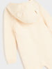 Beige baby outfit with a hood on a white background