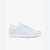 A light blue and white Lacoste low-top sneaker shown from the side profile against a clean white background.