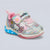 A children's Hello Kitty sneaker featuring a holographic silver upper, pink laces and lining, a pink Hello Kitty face graphic, and a glowing blue LED sole, shown on a light gray background.