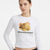 A woman wearing a white long-sleeve ribbed crop top with a graphic of a sleeping orange tabby cat with pink ears and the text 'Misunderstood' printed below, against a plain white background.