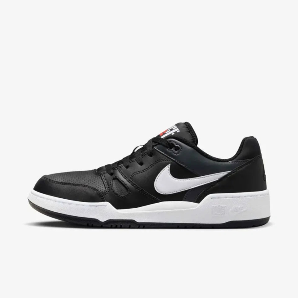 Black leather sneaker on a white background