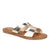 Gold sandal with a brown sole on a white background