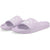 A pair of Puma slide sandals in a light lavender purple color, featuring a textured strap with a white Puma logo and a matching purple footbed.