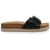 A black leather slide sandal with a wide strap, a black square buckle, a cork midsole, and a braided jute espadrille sole, shown in a side profile on a white background.