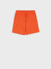 Orange shorts on a white background