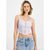 A woman modeling a light lavender lace camisole crop top with a front zipper and thin straps, paired with light-wash blue jeans against a plain white studio background.