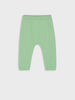 Green baby leggings on a white background