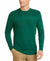 Man wearing a green sweater and beige pants on a white background