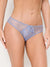 A model wearing a light periwinkle blue lace and mesh thong with a small bow detail at the front center, shown from the waist to upper thighs against a plain light background.