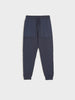 Navy blue jogger pants on a light gray background
