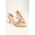 A pair of beige pointed-toe kitten heels with thin metallic glittery straps across the instep, displayed on a clean off-white background.