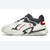White athletic shoe with black accents on a white background