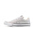 A single low-top sneaker in a textured, glittery light silver or white finish, shown from the side against a plain white background.