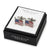 A pair of silver-toned cufflinks shaped like waving American flags, displayed on a white insert inside a black Perry Ellis Portfolio gift box.