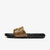 Black slide sandal with leopard print strap on a white background