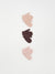 Set of three baby socks in pink, brown, and beige on a white background