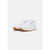 A pair of Reebok Classic Leather sneakers in white with gum brown soles, shown from a three-quarters angle on a light gray background.
