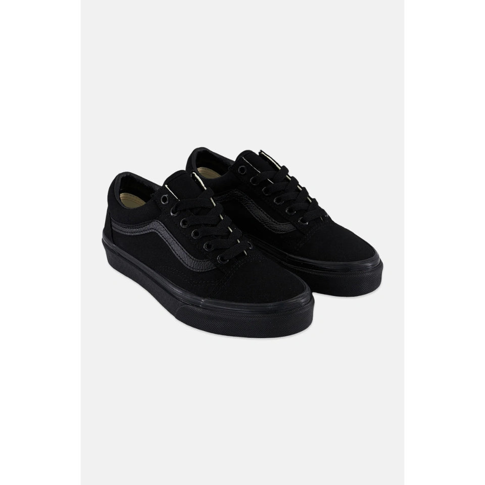 A pair of black slip-on mesh sneakers with black soles, shown from a three-quarters angle on a plain white background.