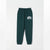 Dark green sweatpants with a white 'NYC' graphic on the left thigh, featuring an elastic waistband with a drawstring and elastic cuffs, shown against a light gray background.