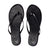 A pair of black leather flip-flop sandals with white 'TIME & TRUL' branding printed on the footbeds, shown from a top-down view on a white background.