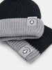 Two ribbed knit hats with Little Penguin labels on a white background