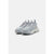 A pair of light gray chunky sneakers with a thick textured sole, shown from a three-quarters angle on a light gray background.