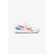 A Reebok sneaker in white with red and blue accents, shown in a side profile on a light gray background.