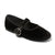Black flat shoe with a strap and circular buckle on a light gray background