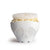 A white ceramic popcorn bowl shaped like a skull, filled with popcorn and topped with a translucent white lid, on a white background.