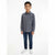 A young boy modeling a long-sleeve gray button-up shirt with dark blue jeans and white sneakers, standing against a plain white studio background.