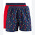 Two pairs of men's boxer shorts displayed together on a white background. The front pair is navy blue with a colorful spider print, and the pair behind it is solid red with a navy waistband.